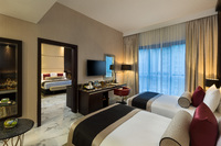 Elegant room, city views, luxurious comfort.