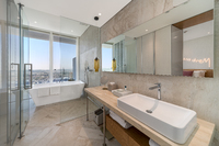 Floor-to-ceiling windows, private balcony, homely.