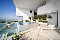 Stylish penthouse villas, panoramic views.
