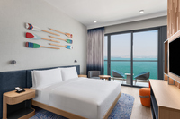Relaxing room, pool and beach view.