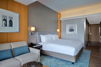 Bright spacious room with a furnished balcony.