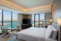 Showcases Dubai Marina Skyline with sea views.