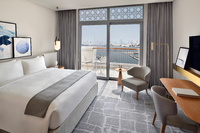 King Bedroom with Balcony and Marina View.