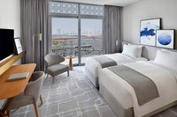 Twin Bedroom with Balcony and Marina View.