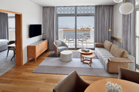 King Bed with Balcony and Marina View.