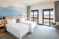 Modern room with city views.