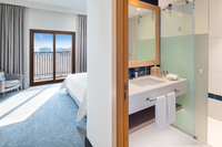 Modern room with city views.