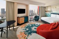 Spacious suite with vibrant lounge area.