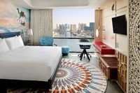Expansive, vibrant suite with panoramic creek view
