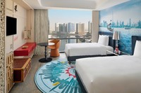 Expansive, vibrant suite with panoramic creek view