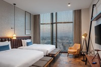 King beds, balcony, three HDTVs.