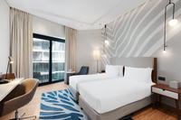 Twin Beds and City-view studio with full kitchen.