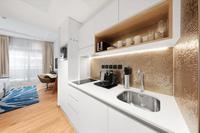 Twin Beds and City-view studio with full kitchen.