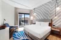 King Bed and City-view studio with full kitchen.