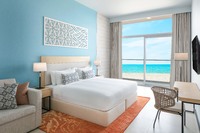 Has a balcony, cable TV, and sea view.