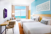 Double beds, balcony with sea view, and cable TV.