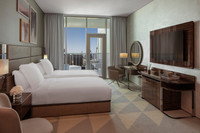 King bed, balcony, Dubai Canal view.