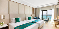 Sea View rooms with club access.