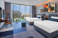 Comfortable room with theme park access.