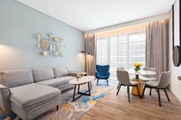 Spacious family suite with city view.