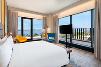 One-bedroom suite with balcony views.