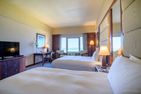 Ocean-view Deluxe Room, luxurious décor.