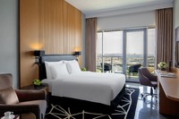 Sleek, spacious, balcony, skyline views.