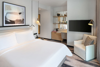 Vibrant Deluxe Room, captivating views.