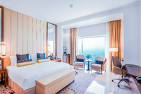 Opulent sea views, plush amenities.