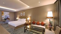 Spacious suites, modern design, amenities.