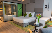Queen Bed with Amenities.