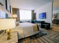 With living room, king-size bed, and sofa bed,