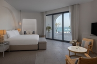 With sophisticated interior & sun-kissed terrace.
