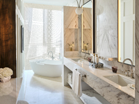 King bed, balcony, marble desk.
