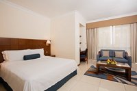 King bed, WiFi, walk-in shower, TV.