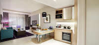 Two-bedroom suite, kitchenette, workspace.