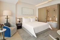 Elegant room with serene canal views.