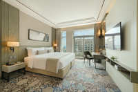 Comfortable room with convenient kitchenette.