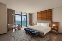Textured coastal retreat with views.