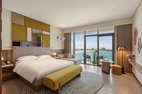 Panoramic coastal luxury with access.