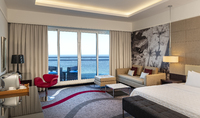Spacious suite with terrace views.