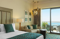 Contemporary Arabian rooms with sea views.