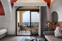 Cozy Nubian-inspired rooms with balcony.