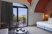 Mediterranean style, lagoon views, king/twin beds.