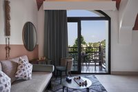 Mediterranean style, lagoon views, king/twin beds.